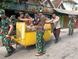 Sambut HUT TNI ke-79, Koramil Temayang Bojonegoro Baksos Bersih-bersih Pasar Induk Temayang
